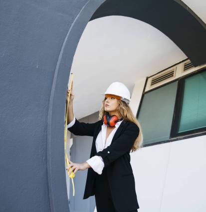 female-architect-construction-site-with-level